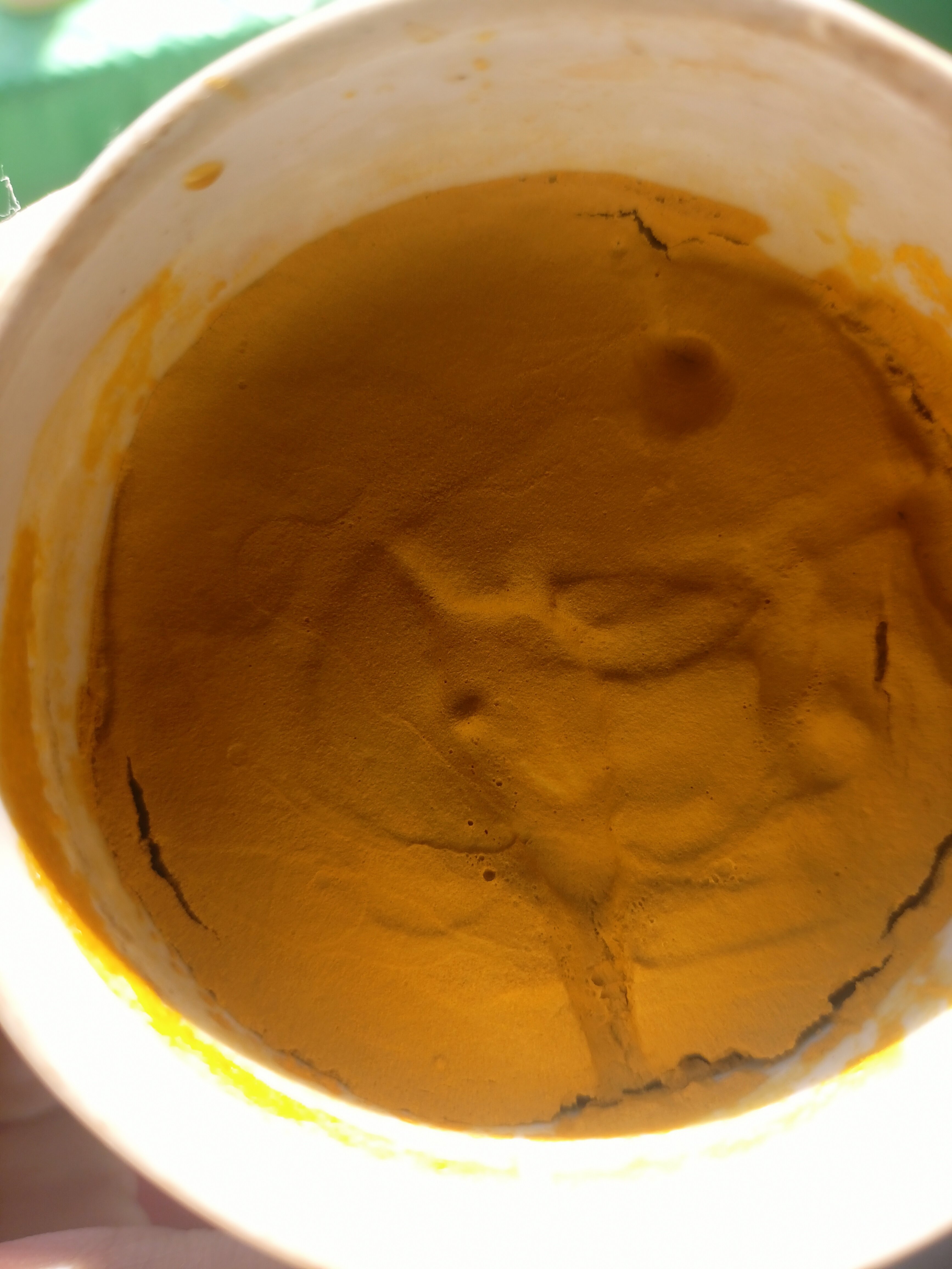 yellowish-brown paste in a buchner funnel